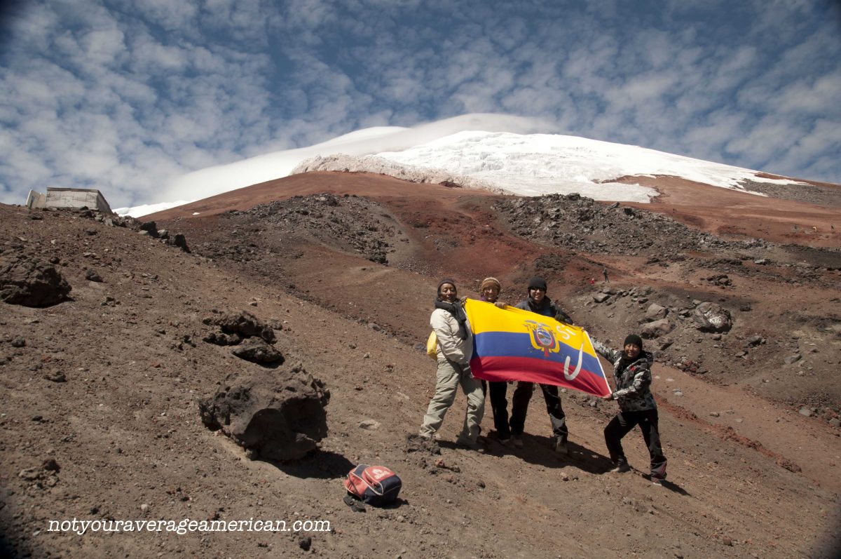 Quiteños & Author holding the Ecuadorian Flag, Cotopaxi National Park, Ecuador | ©Angela Drake