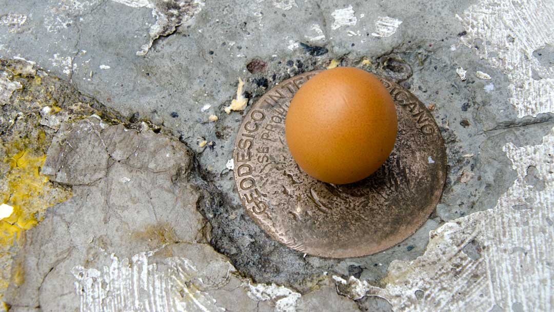 A Balanced Egg at the authentic Mitad del Mundo; Buena Esperanza, Cayambe, Ecuador | ©Angela Drake