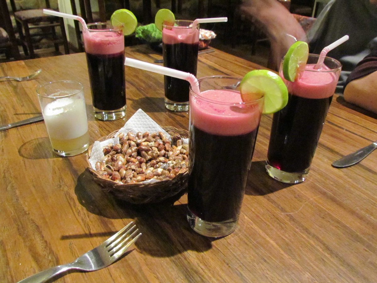 Chicha (almost empty), Chica Morada, and Cancha (toasted corn) | ©Angela Drake