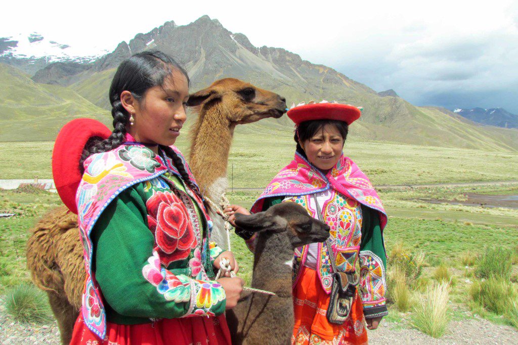 Young women posing for pictures.