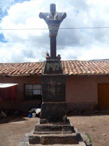 The dressed cross in the town plaza at Raqchi.