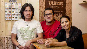 The Owner-Artists of Vulgomeastre stand in their small shop