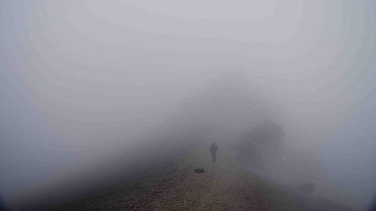 Deep fog covers the trail on Guagua Pichincha