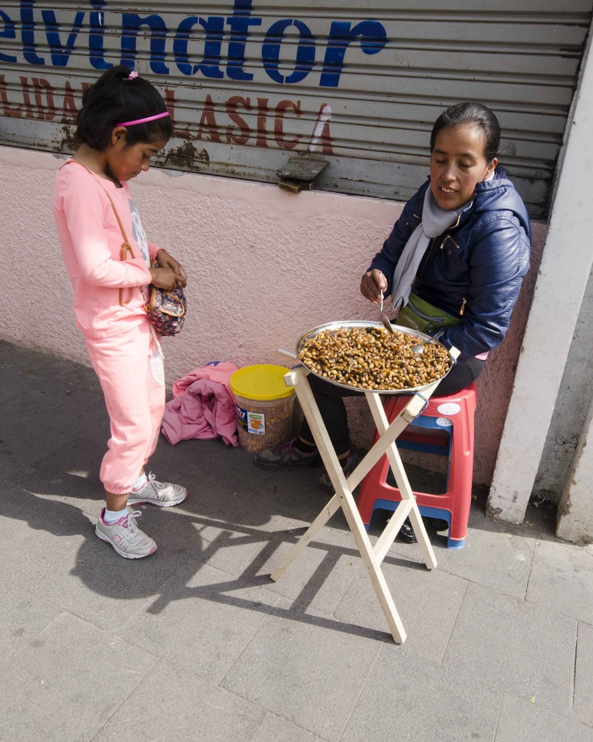 Catzos Vendor in Otavalo, Ecuador | ©Angela Drake