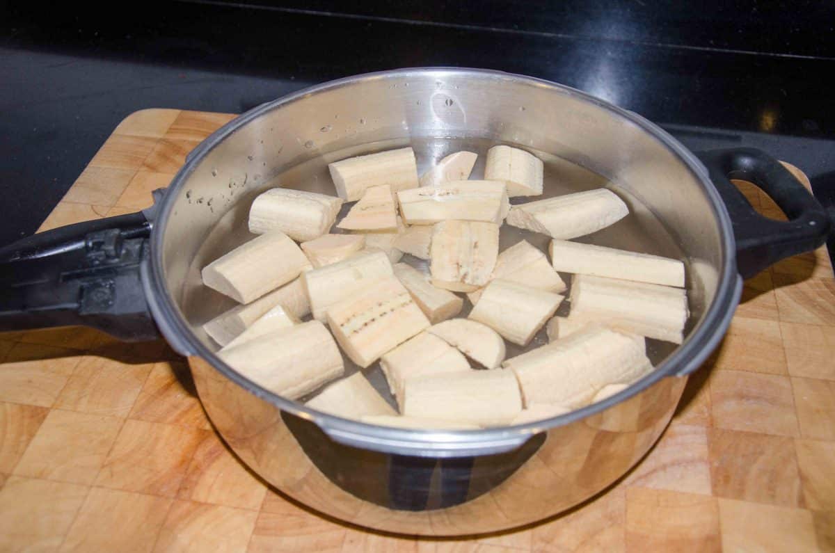 Place plantain in a pot of water; recipe for Bolón de Verde