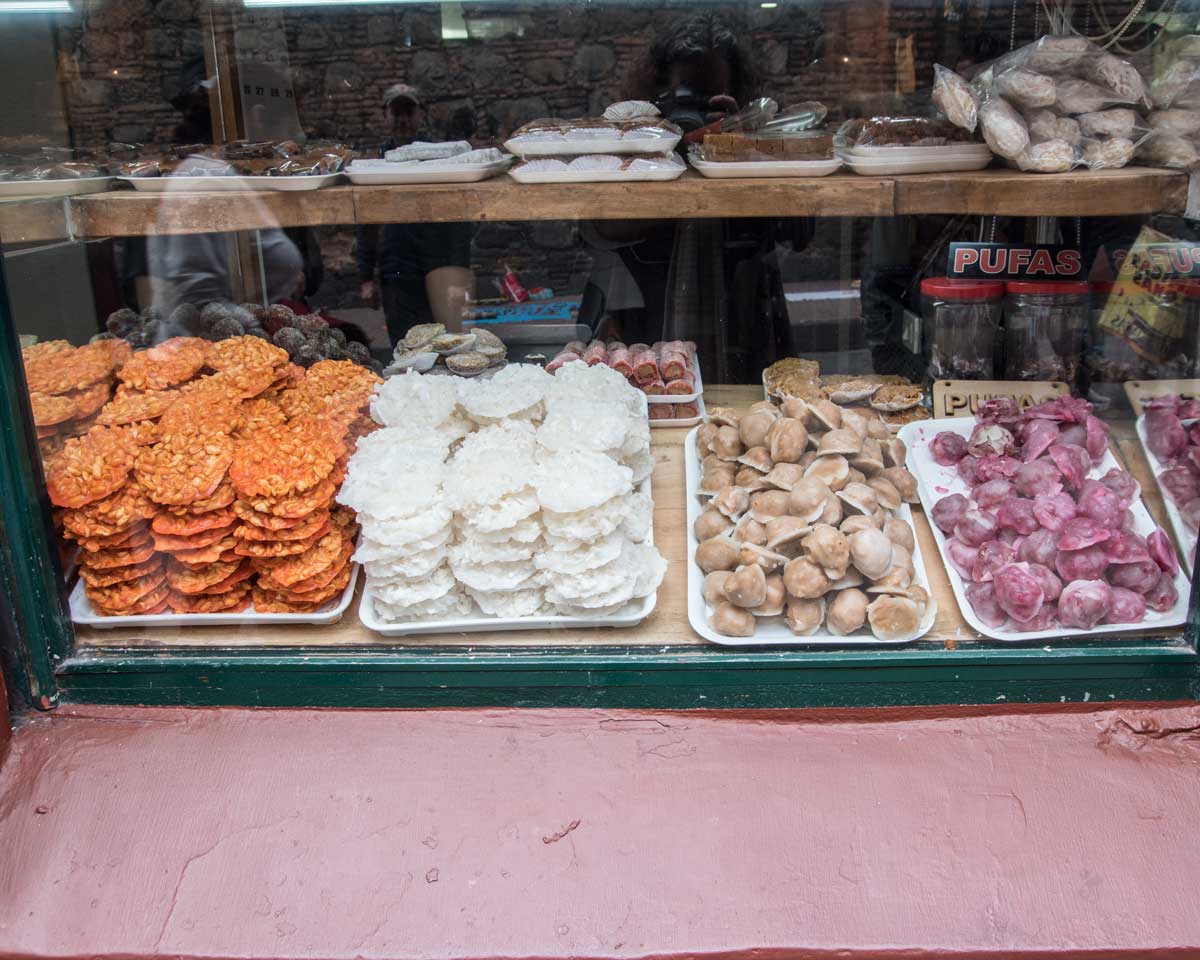A Front Window Full of Sweets, La Puerta Falsa, Bogota | ©Angela Drake