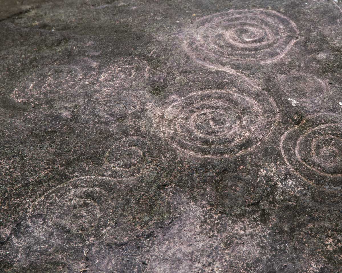 Spiral Petroglyphs in Guizhaguiña, Cascada Plano Rumi, Ecuador | ©Angela Drake