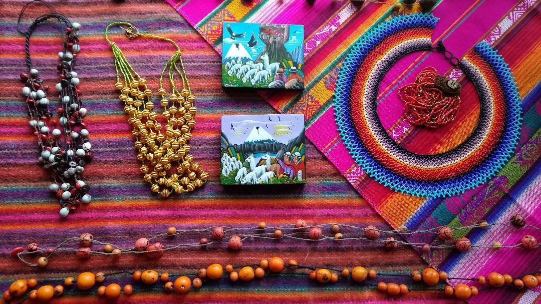 Jewerly, small paintings, and woven goods from the Otavalo Artisan Market