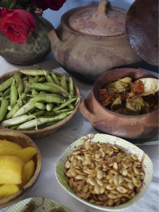 A selection of local foods in Cuemal, Peru like habas, potatoes, and toasted corn.