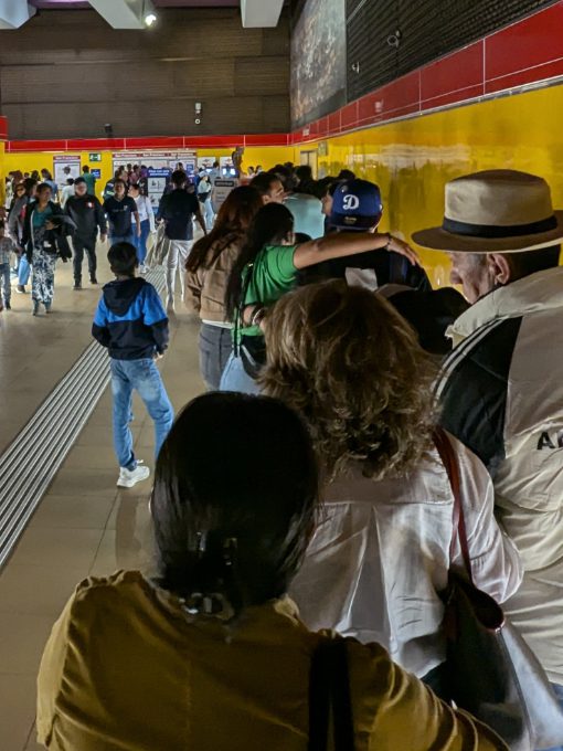 Waiting in a long line to puchase tickets at the San Francisco Metro Station in Quito, Ecuador