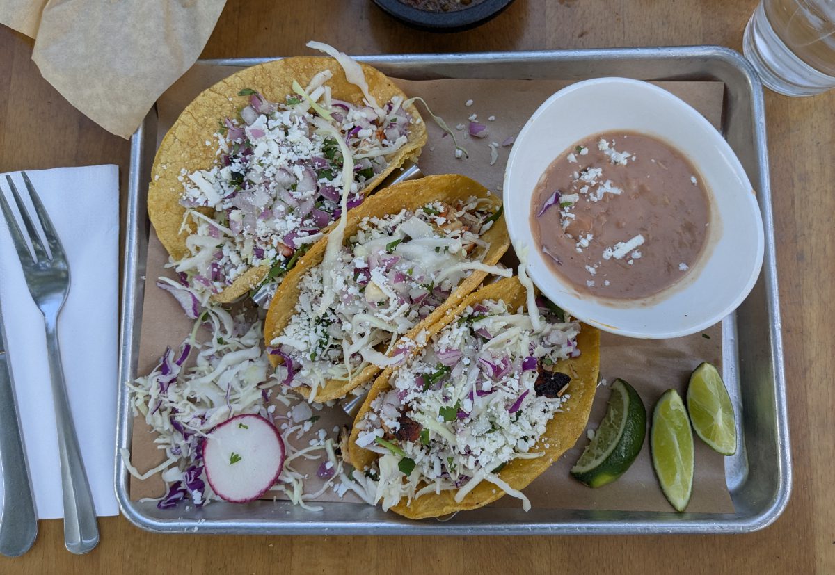 Tacos from Seis Kitchen Tacos with a side of refried beans from Seis Kitchen, The Mercado, Tucson, Arizona