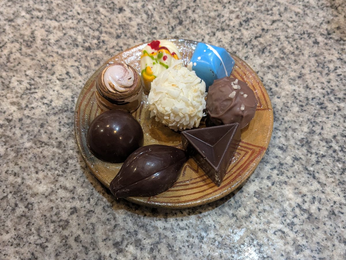 A selection of Maná chocolates including the famous acevichado (white with splotches of red, yellow and green)