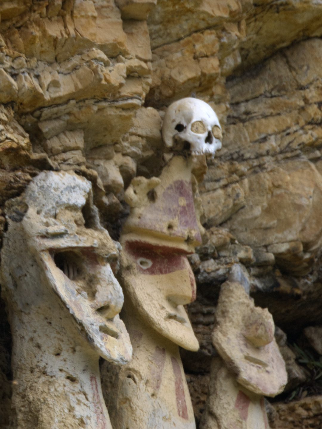 One of the better preserved figures at Karajia has the remains of a skull jutting from its headpiece
