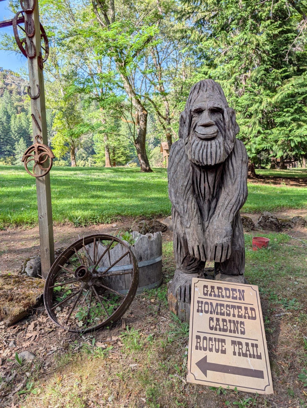 A Sasquatch carved fro a wooden log greets visitors at Paradise Lodge