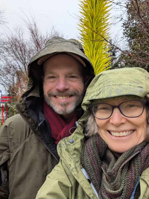Scott and Angie testing out raingear during a Pacific Northwest winter rainstorm.