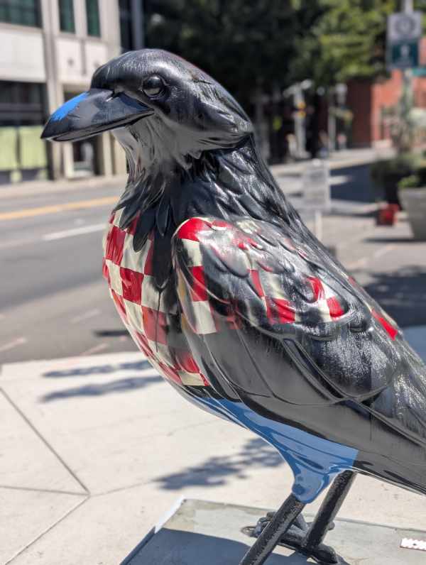 A profile view of Paul Birdyan, a sculpture on the Follow the Crows trail in Portland, Oregon